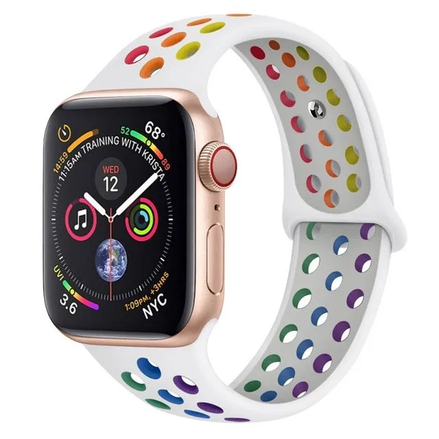 Adjustable silicone sports wristband in black, white, or rainbow colours with a buckle closure.