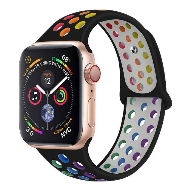Adjustable silicone sports wristband in black, white, or rainbow colours with a buckle closure.