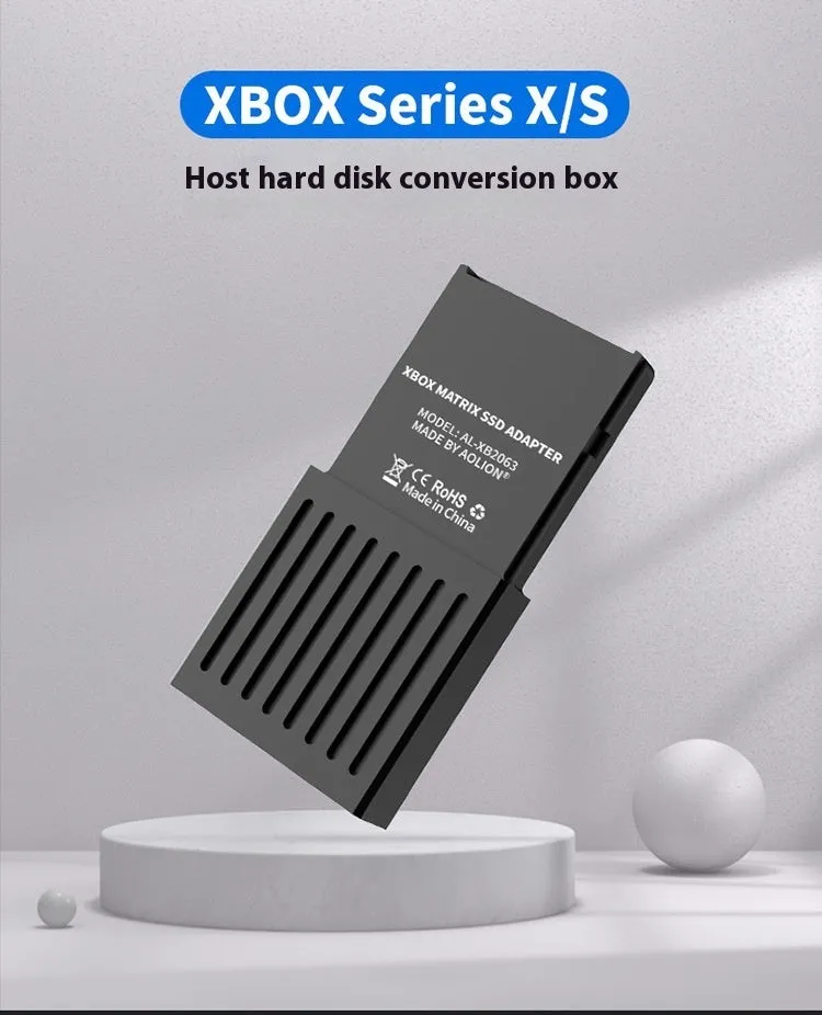 Aluminium Xbox Series X/S hard drive switching box with CFexpress interface and screwdriver.