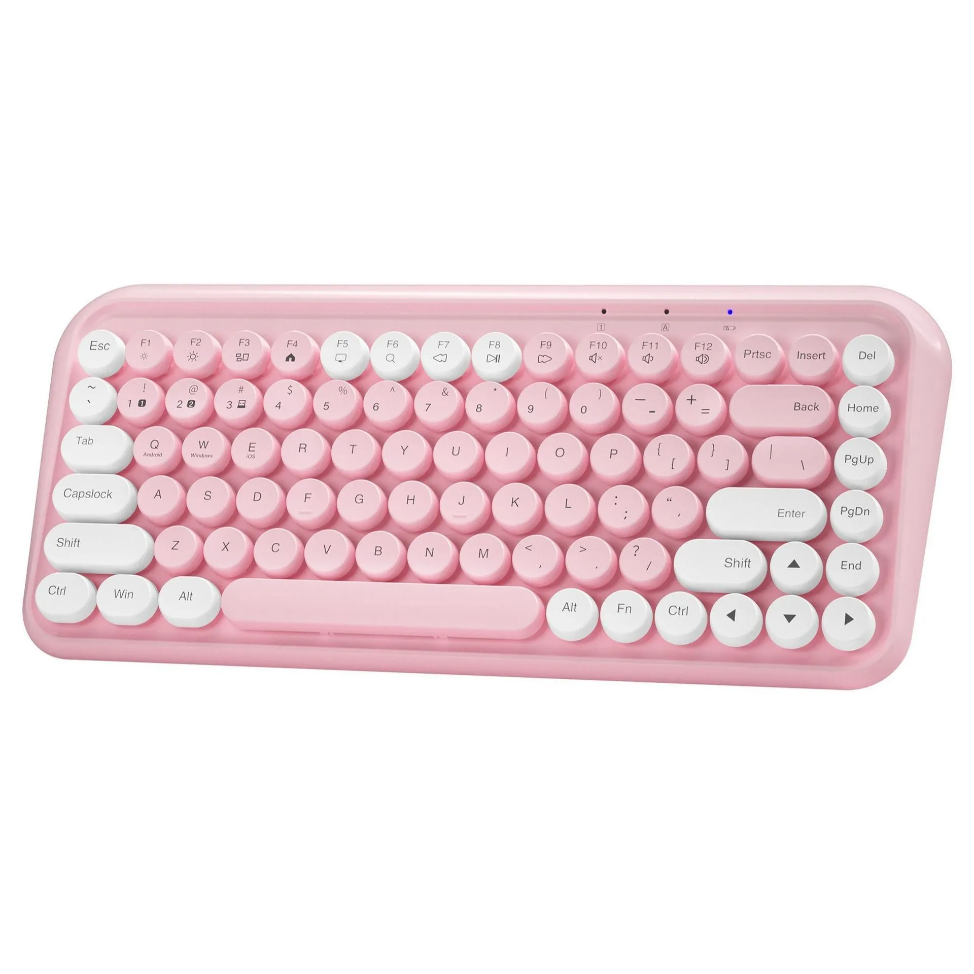 Pink portable Bluetooth keyboard with 84 keys on a desk.