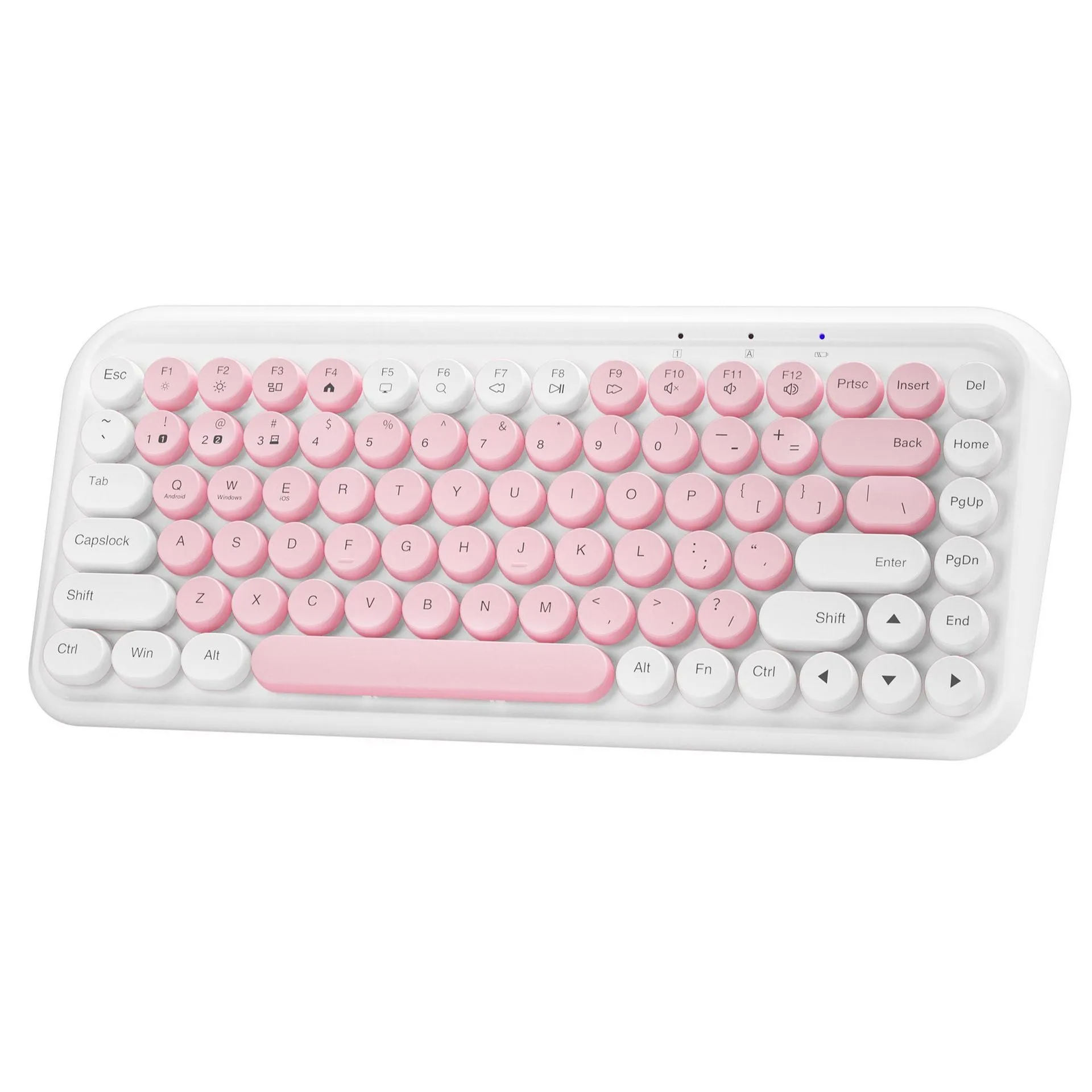 Pink portable Bluetooth keyboard with 84 keys on a desk.