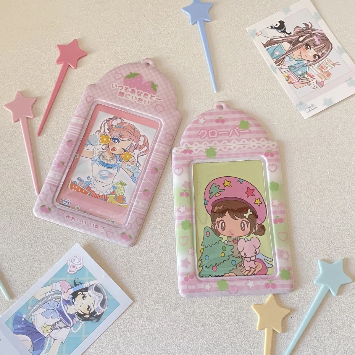 Cartoon strawberry and four-leaf clover PVC meal card holder pendants showing 3-inch card window