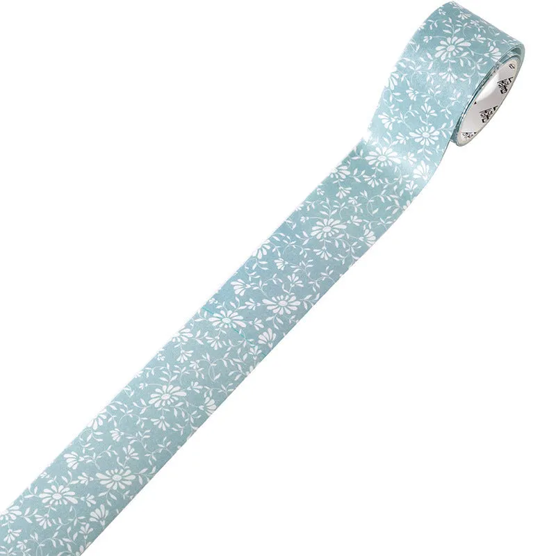Roll of vintage floral watercolour washi tape on a Japanese paper base, showing patterns like Fog Mountain Forest.