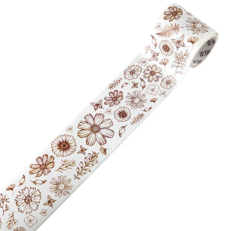 Roll of vintage floral watercolour washi tape on a Japanese paper base, showing patterns like Fog Mountain Forest.