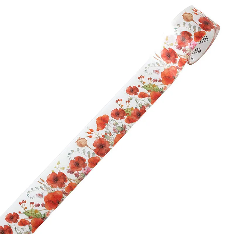 Roll of vintage floral watercolour washi tape on a Japanese paper base, showing patterns like Fog Mountain Forest.