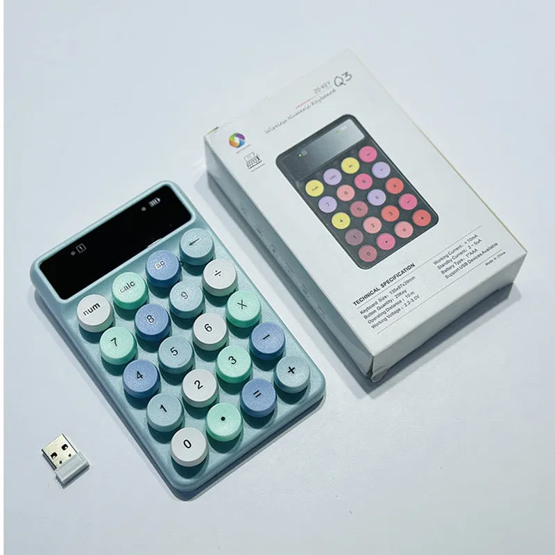 Mini portable wireless keyboard in a macaron colour option on a desk.