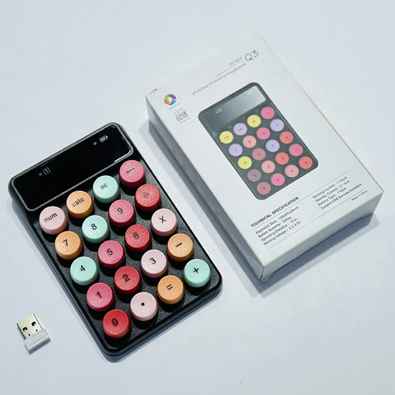 Mini portable wireless keyboard in a macaron colour option on a desk.
