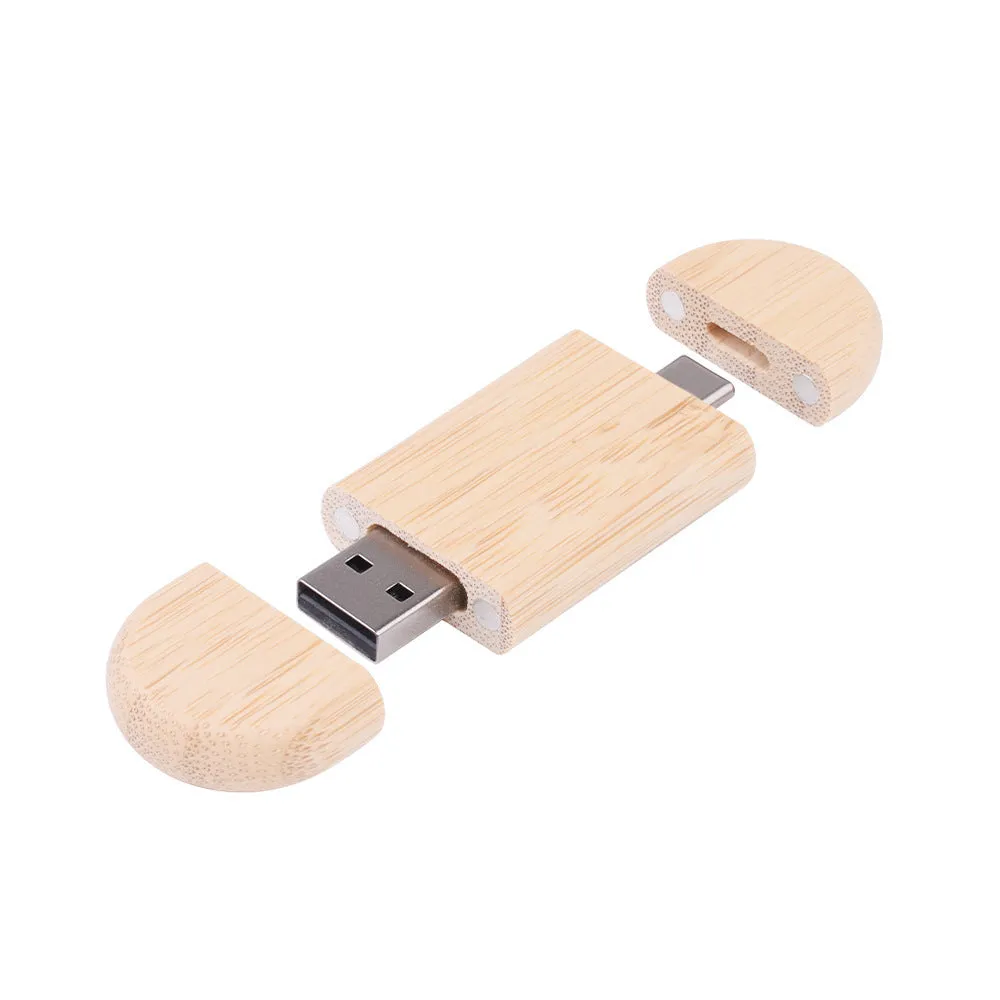 Custom engraved maple wood USB flash drive with Type-C connector for mobile phones on a wooden box.