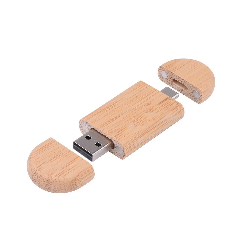 Custom engraved maple wood USB flash drive with Type-C connector for mobile phones on a wooden box.