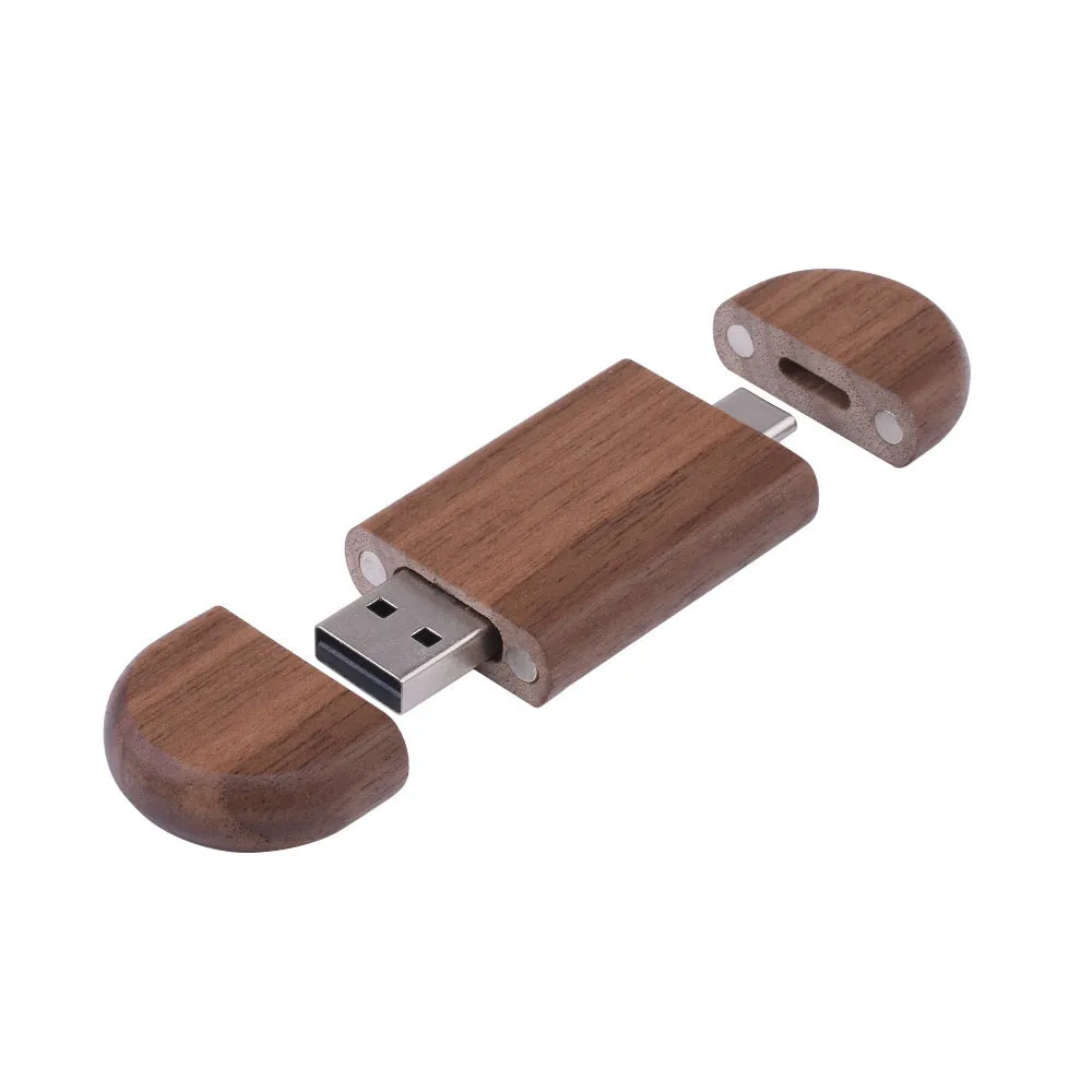 Custom engraved maple wood USB flash drive with Type-C connector for mobile phones on a wooden box.