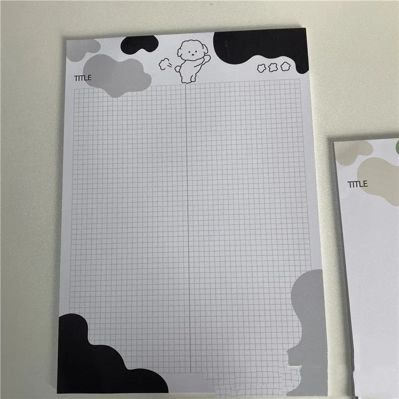 INS Wind Marshmallow Dog B5 sticky note paper pad showing colourful puppy cover designs.