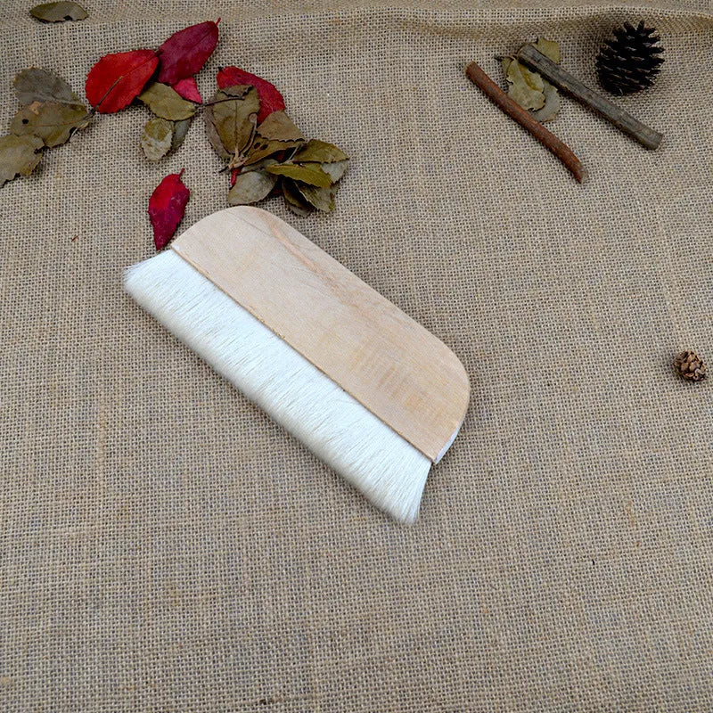 Natural wool brush for art mounting and shading craft projects in four size options.