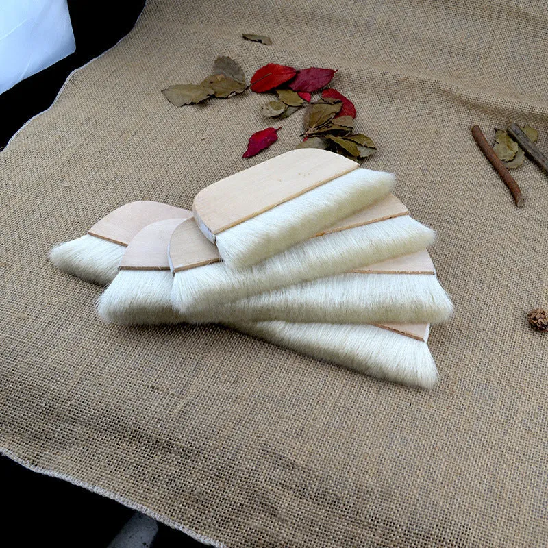 Natural wool brush for art mounting and shading craft projects in four size options.
