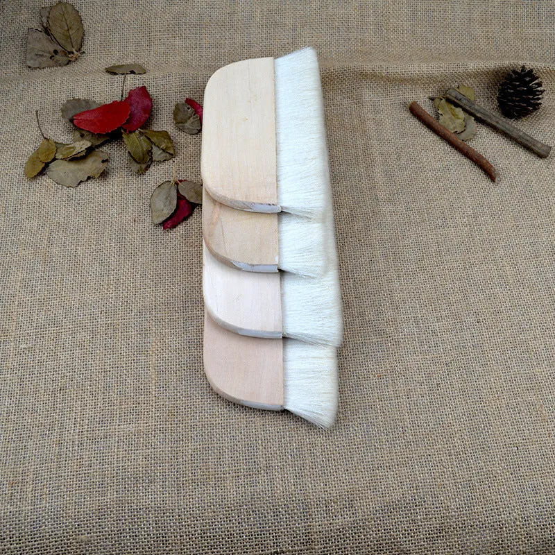 Natural wool brush for art mounting and shading craft projects in four size options.
