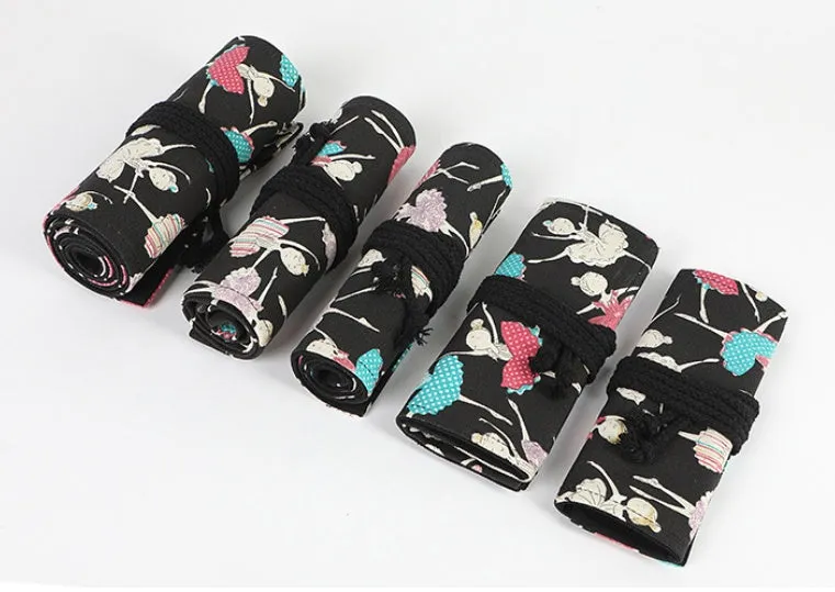 Canvas rolling pencil case with ballet girl print, showing multiple hole capacity options for colour pencils.