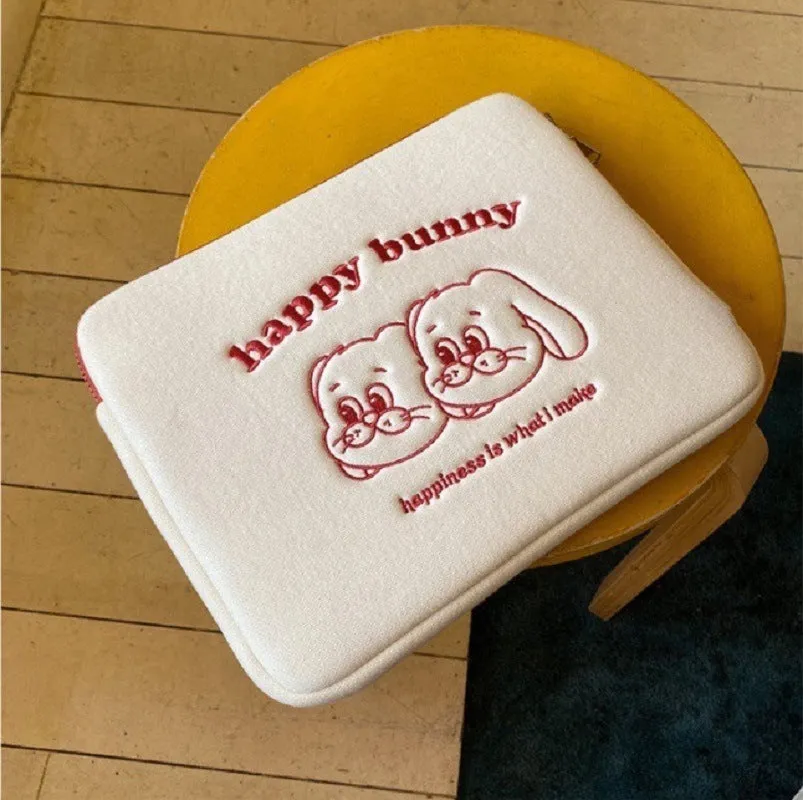 Embroidered animal design laptop sleeve in polyester, showing size options for 13, 14 and 15.6 inch laptops.