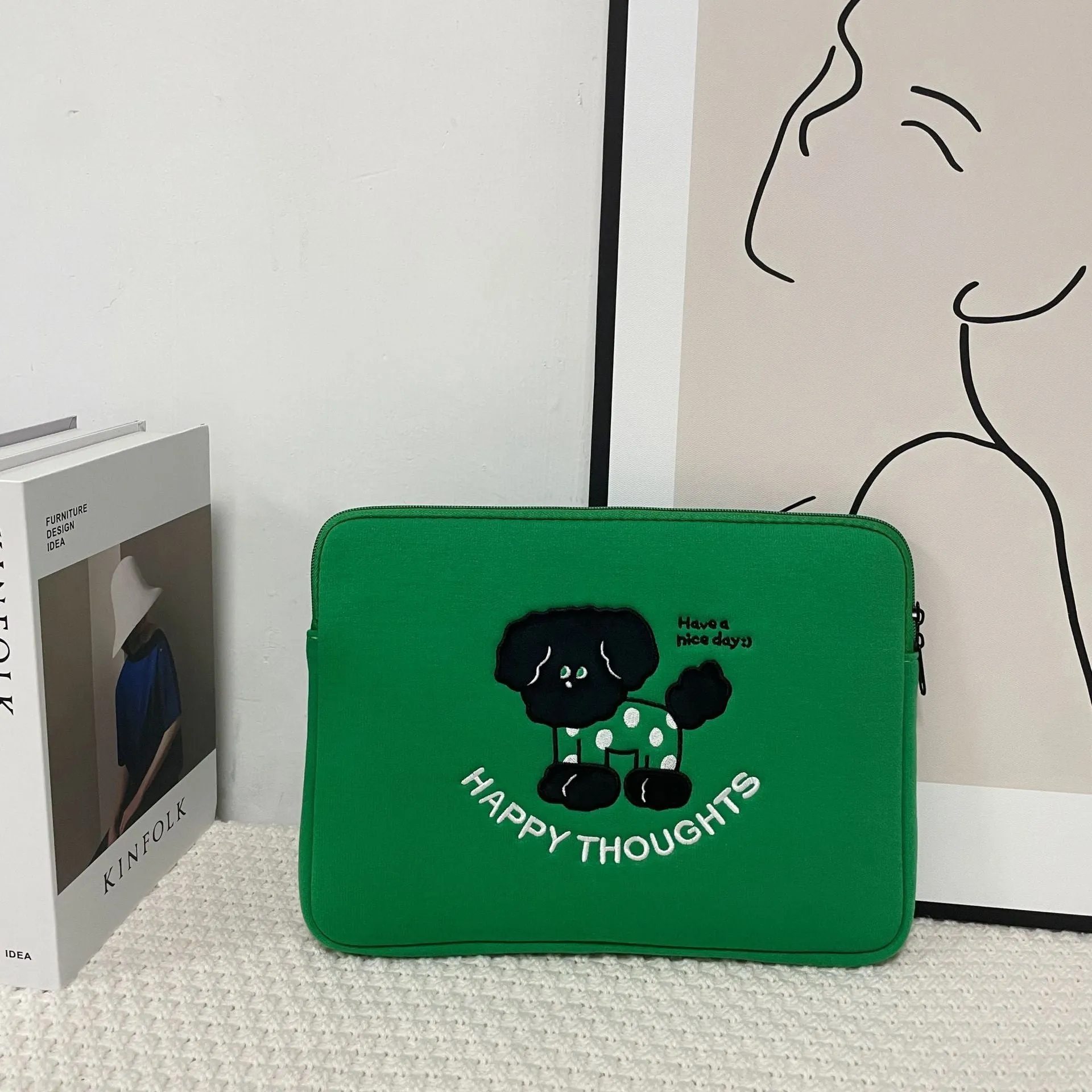Embroidered animal design laptop sleeve in polyester, showing size options for 13, 14 and 15.6 inch laptops.