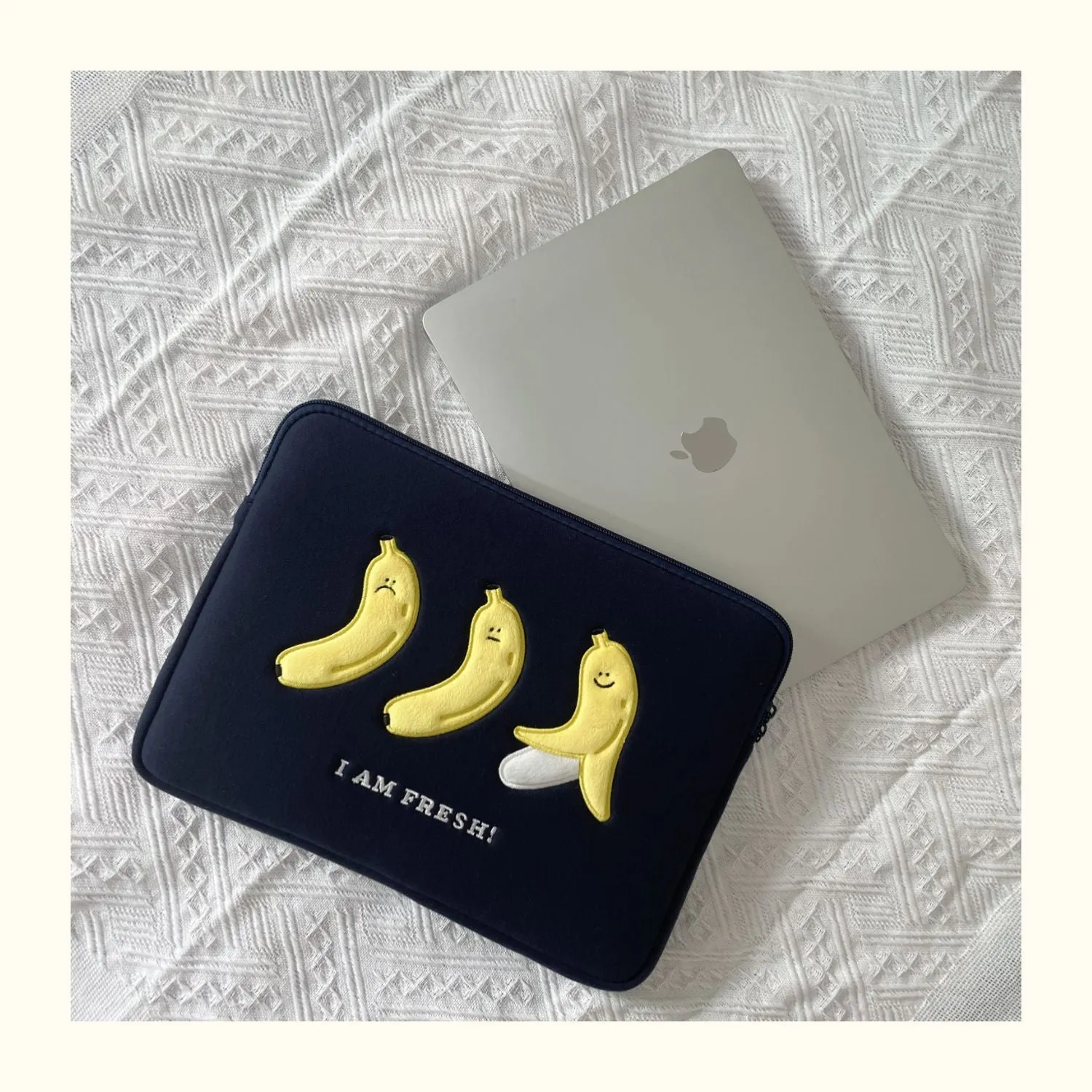Embroidered animal design laptop sleeve in polyester, showing size options for 13, 14 and 15.6 inch laptops.