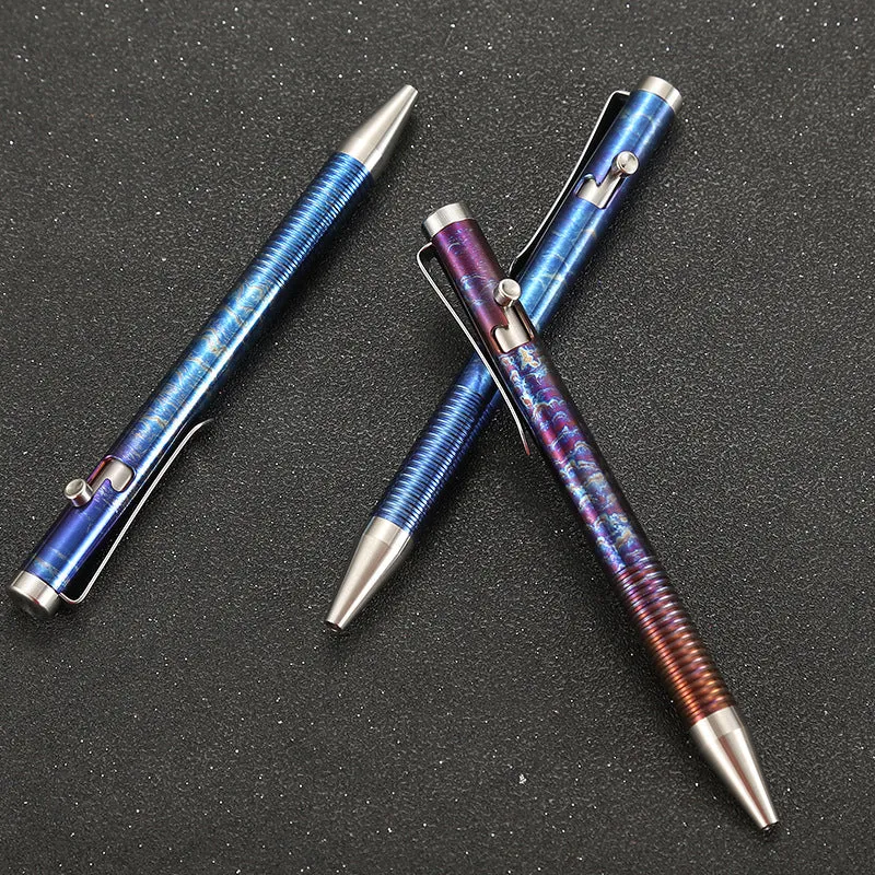Titanium alloy bolt action ballpoint pen with magic colour phantom finish showing gun bolt handle detail.