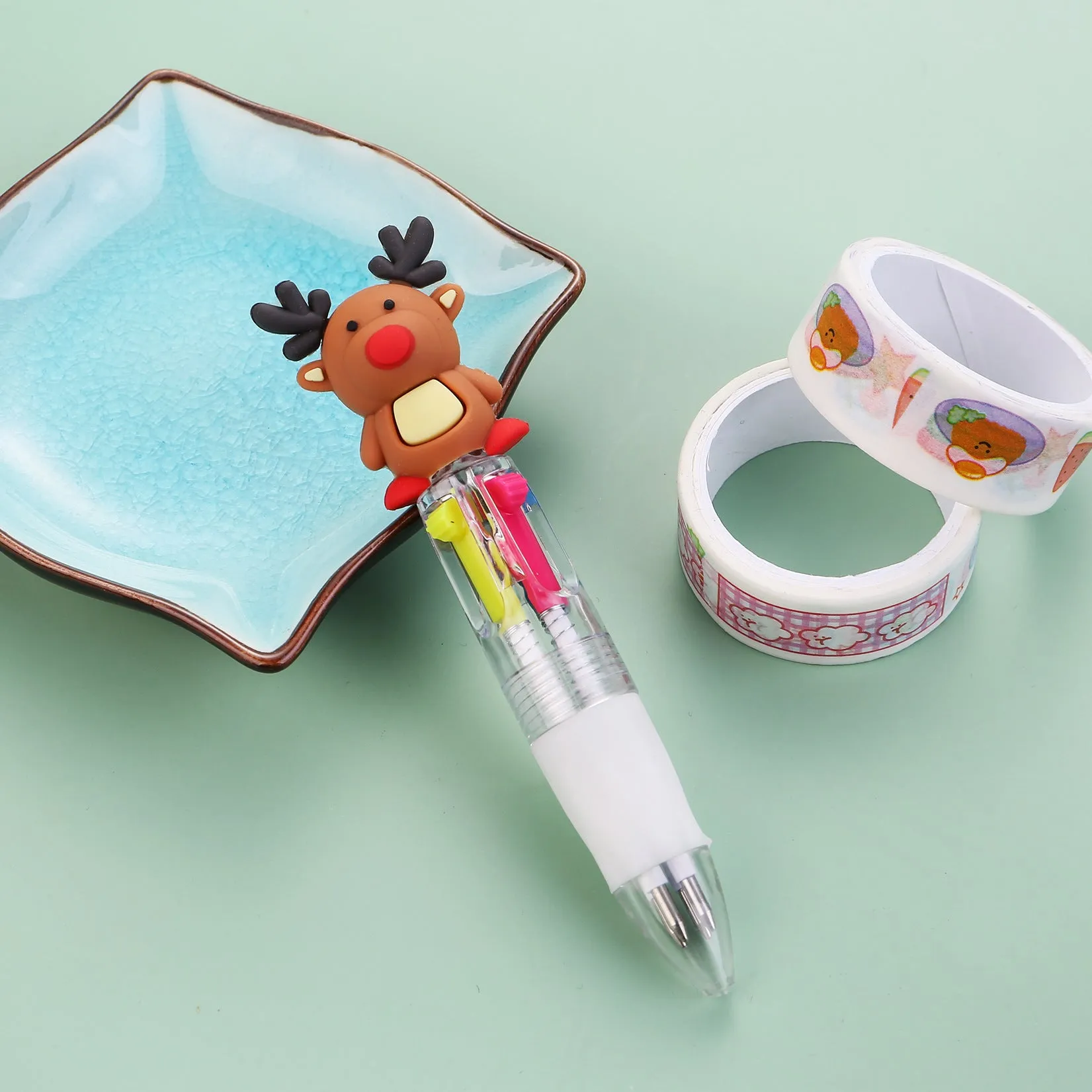 Christmas four-colour press ballpoint pen with festive designs, 11cm compact size