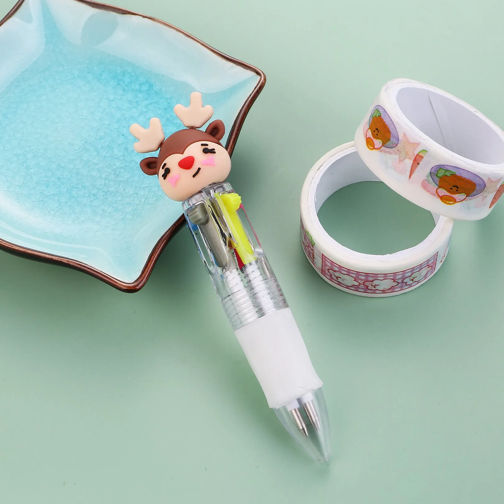 Christmas four-colour press ballpoint pen with festive designs, 11cm compact size
