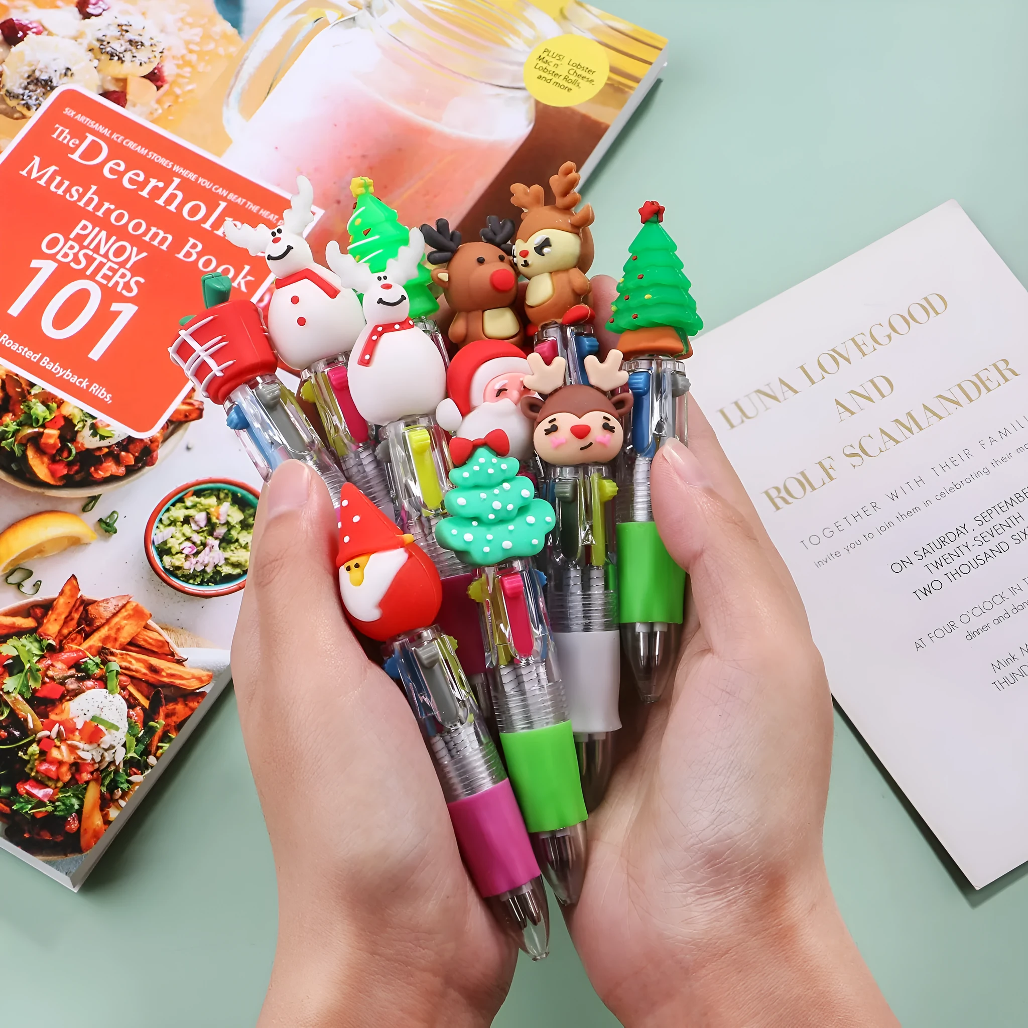 Christmas four-colour press ballpoint pen with festive designs, 11cm compact size