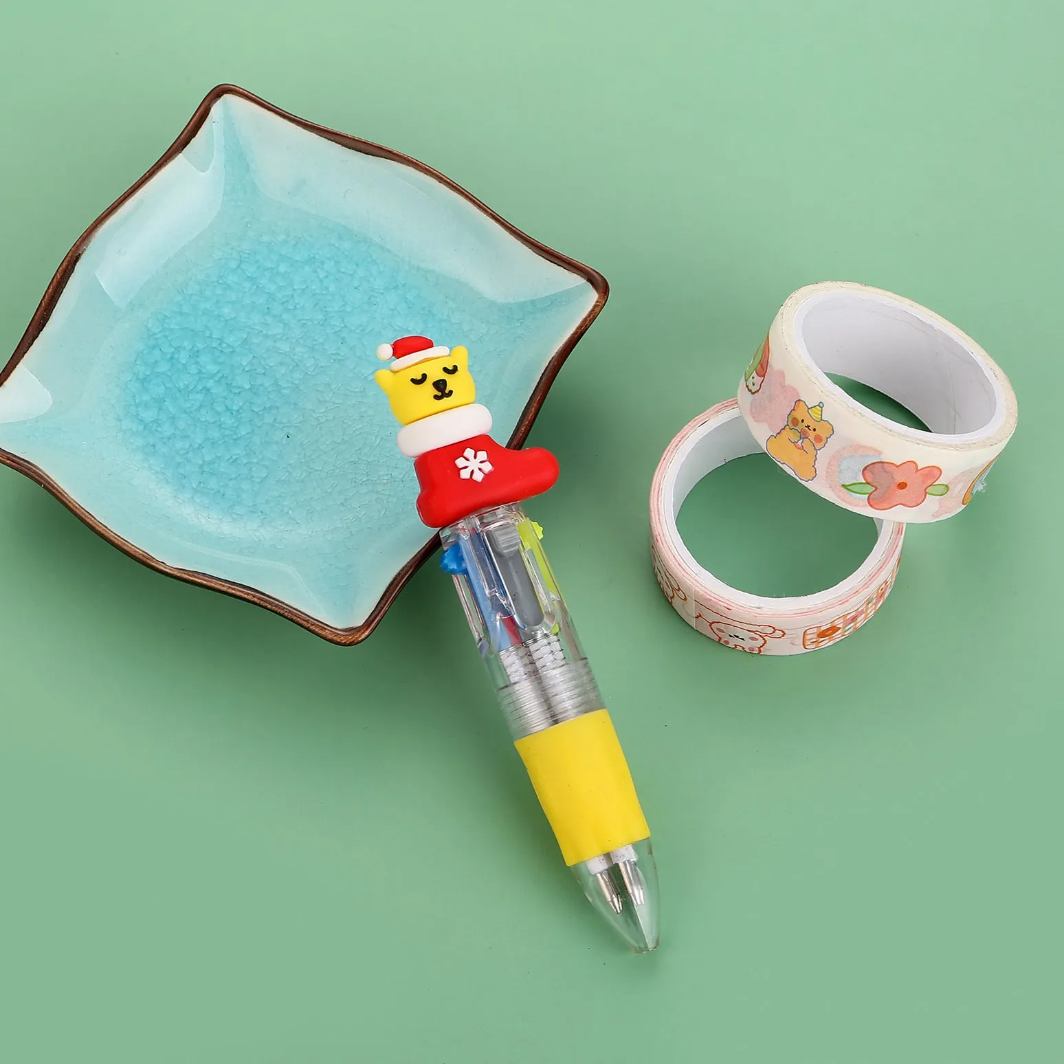 Christmas four-colour press ballpoint pen with festive designs, 11cm compact size