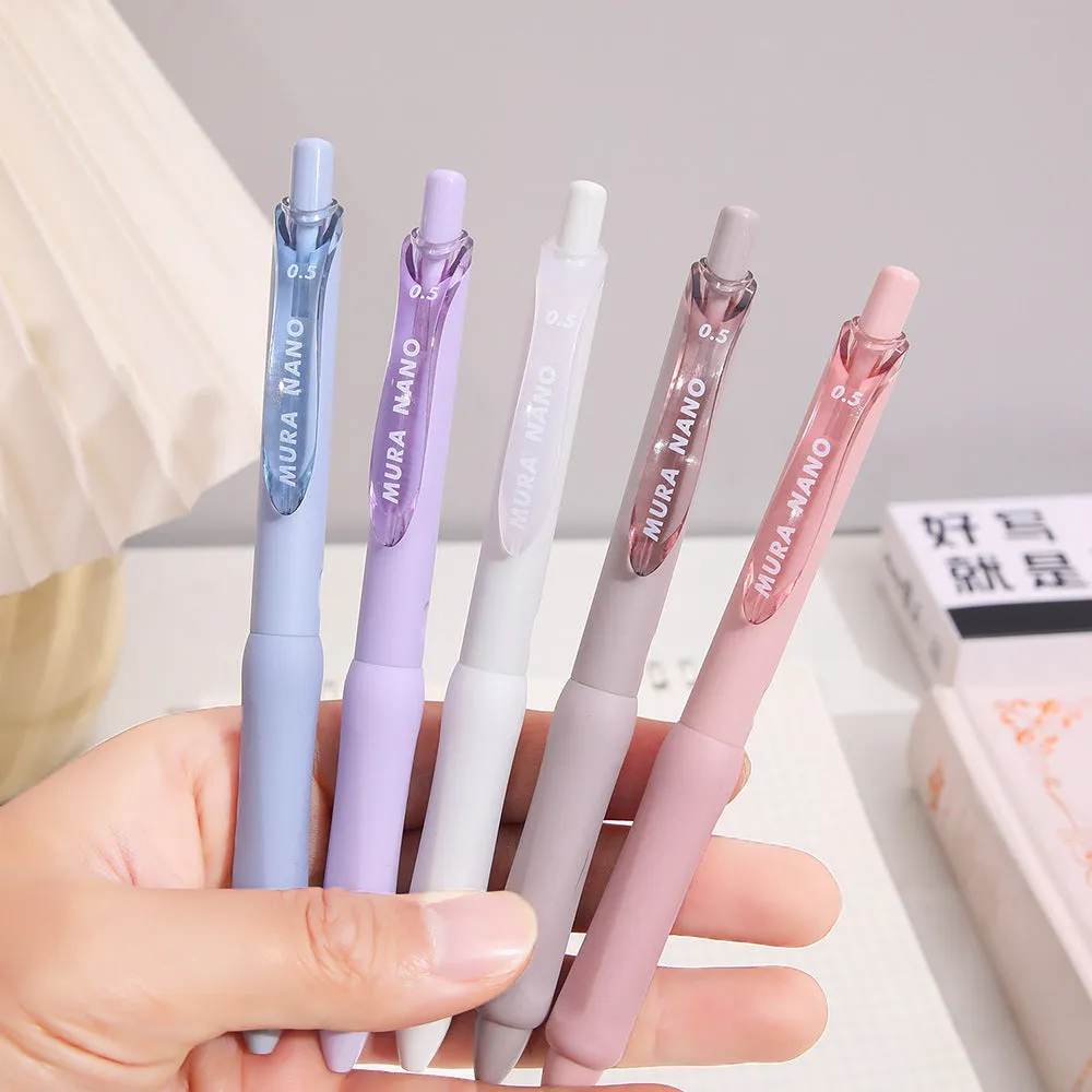 Three macaron-coloured clicker gel pens with 0.5mm fine tips in smoked white, brown, and pink shades