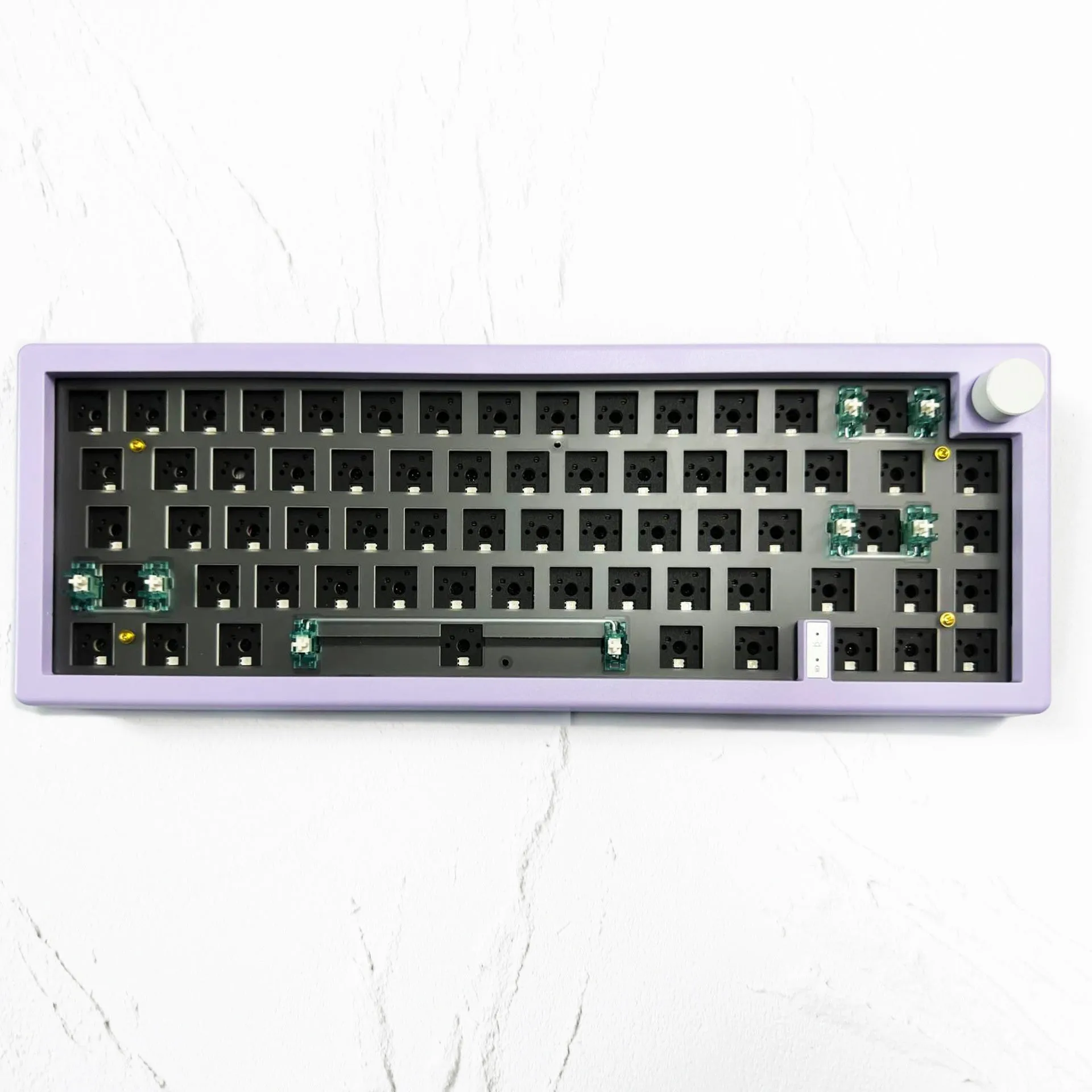 DIY mechanical keyboard kit with RGB lighting and control knob in multiple colour options