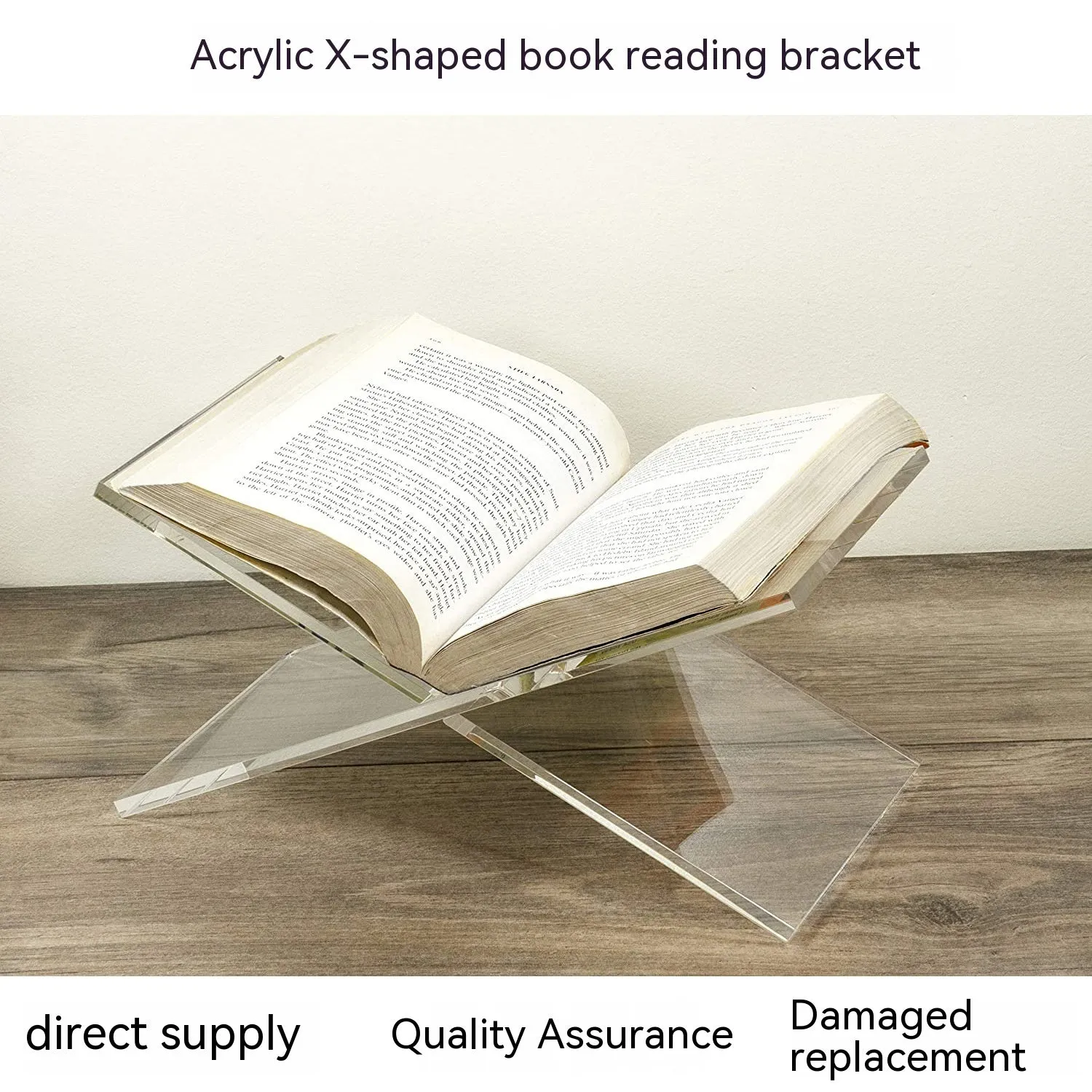 Clear acrylic X-shaped book display shelf holding reading materials on desktop