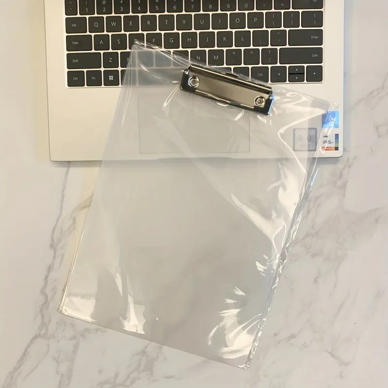 Clear A4 plate holder with metal clip and transparent writing pad in blue colour on a desk.