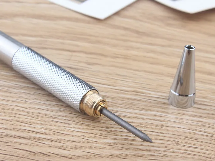 Metal automatic mechanical pencil showing six compatible lead sizes from 0.3mm to 2.0mm