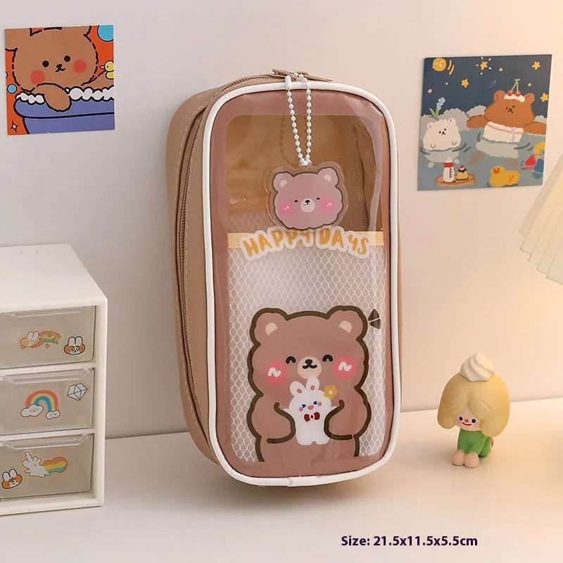 Transparent PVC pencil case with cartoon design showing pens and pencils inside