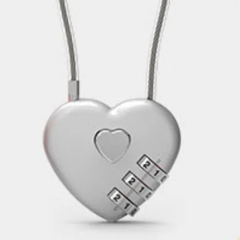 Peach Heart shaped wire rope lock in ABS plastic for securing bicycle helmets.