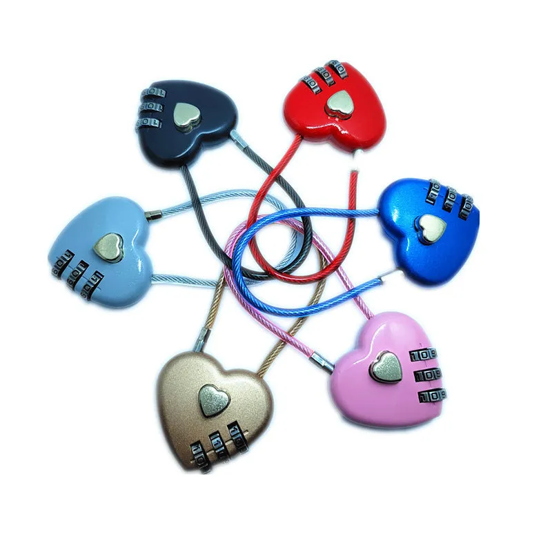 Peach Heart shaped wire rope lock in ABS plastic for securing bicycle helmets.