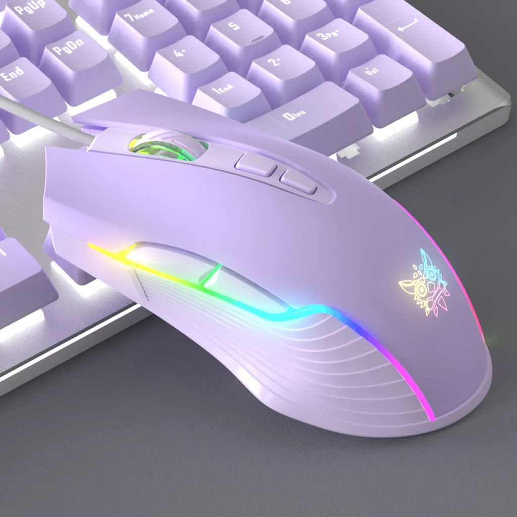 Purple and white mechanical keyboard and optical mouse set with backlighting on desktop