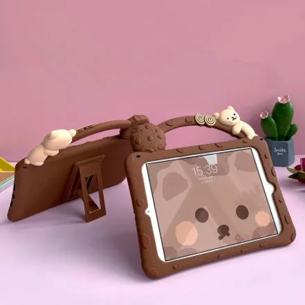 Brown cartoon-style silicone sleeve for iPad with a bracket handle, shown on a tablet.