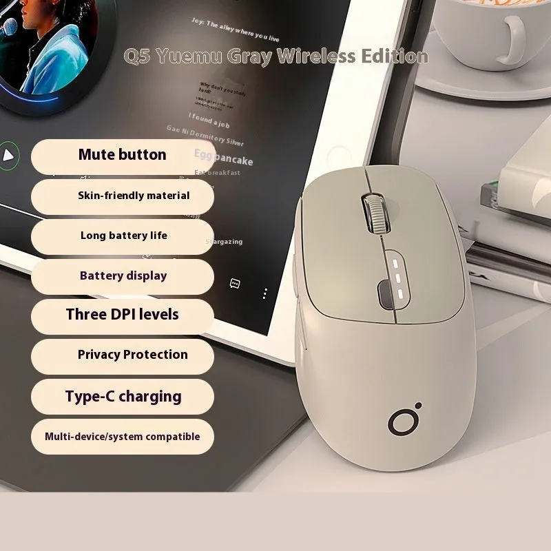 Mute wireless Bluetooth and 2.4GHz computer mouse in Matcha Green colour on a wooden desk