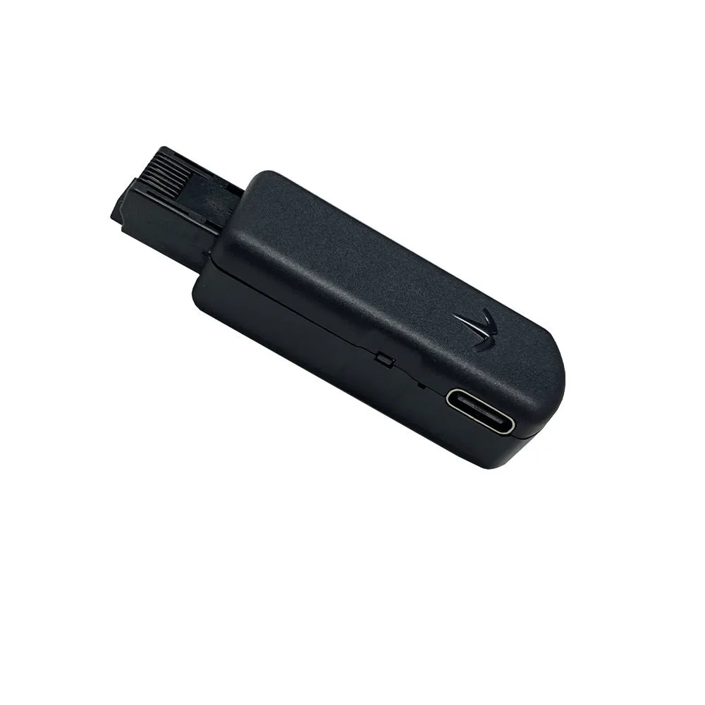 Black JB Tool USB adapter for PS4 system modification with alloy construction and data cable.