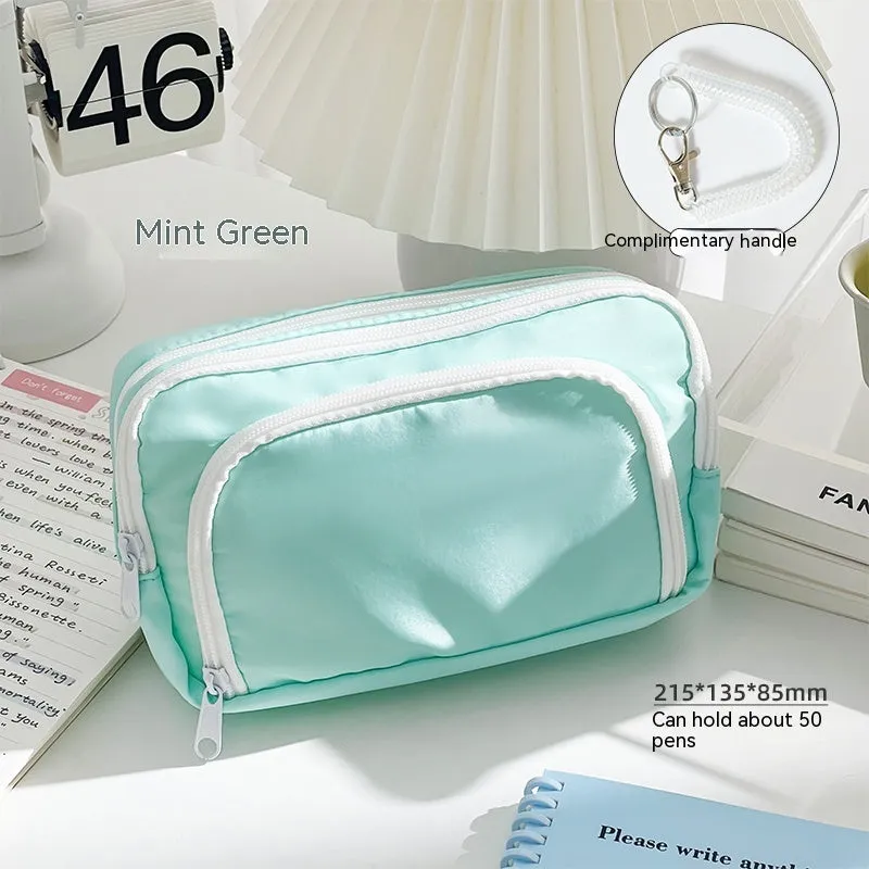 Double-layer high-capacity pencil case with carry handle in solid colour