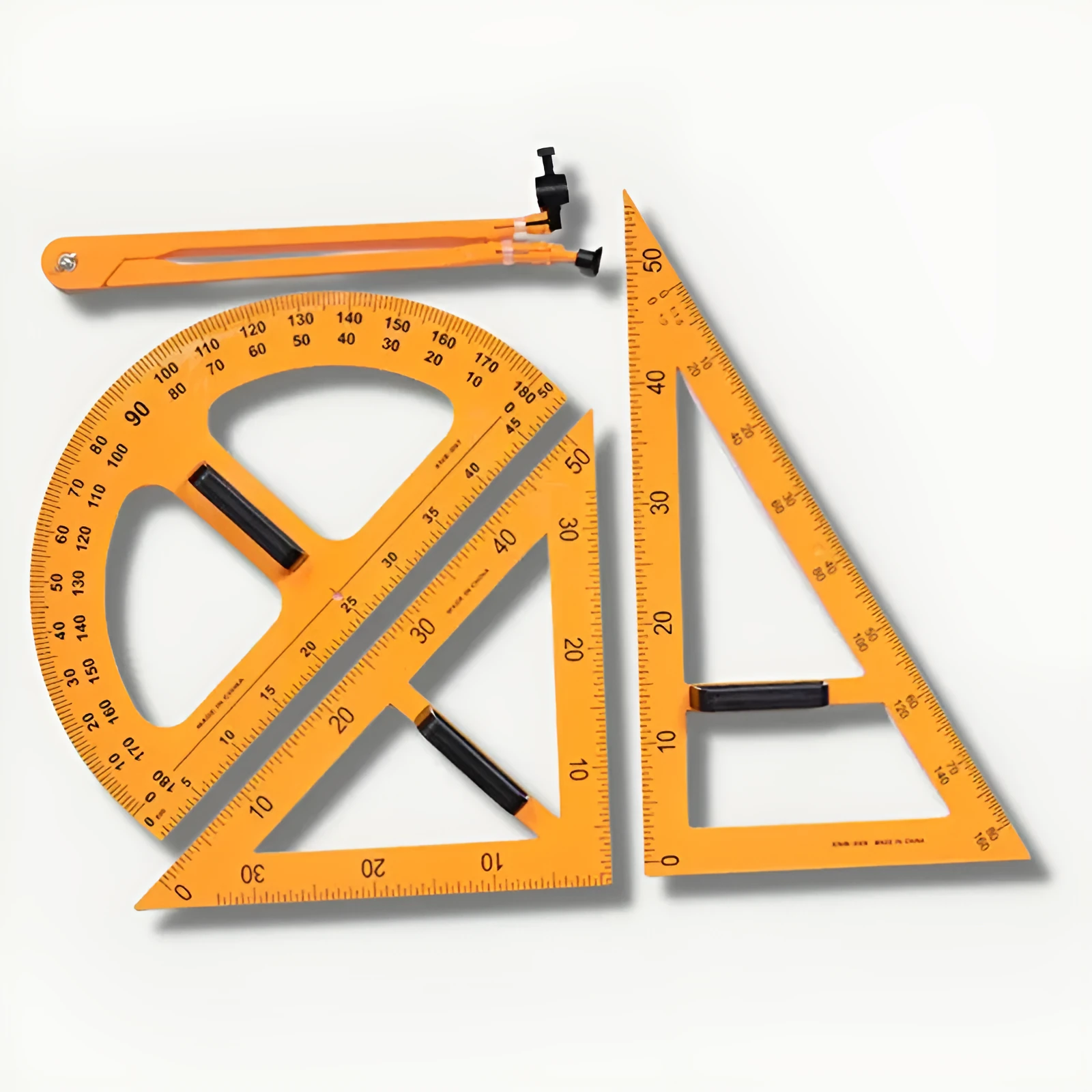Orange and black mathematics teaching set with triangle rulers, protractor and chalk compass