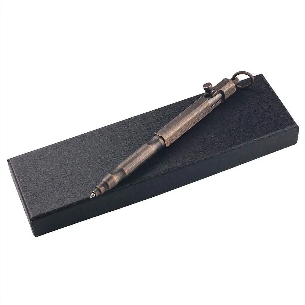 Brass tactical pen with hexagonal bolt pattern showing natural colour finish and precise machining details