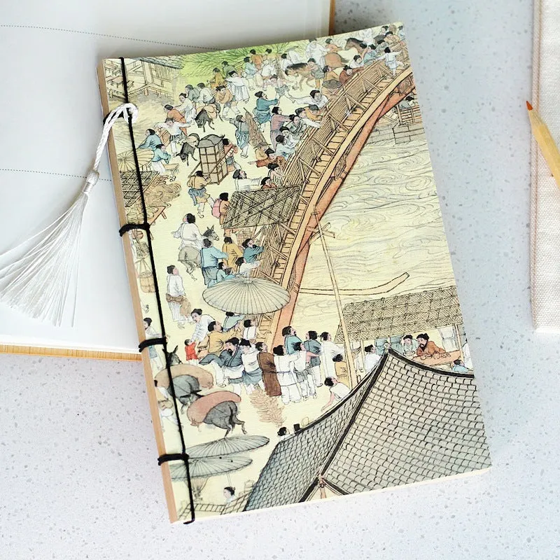 A5 antique-style wire-bound notebook with vintage Chinese painting cover, thread binding, and black wax rope tassel.