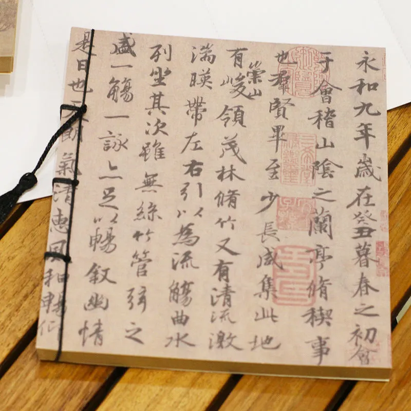 A5 antique-style wire-bound notebook with vintage Chinese painting cover, thread binding, and black wax rope tassel.