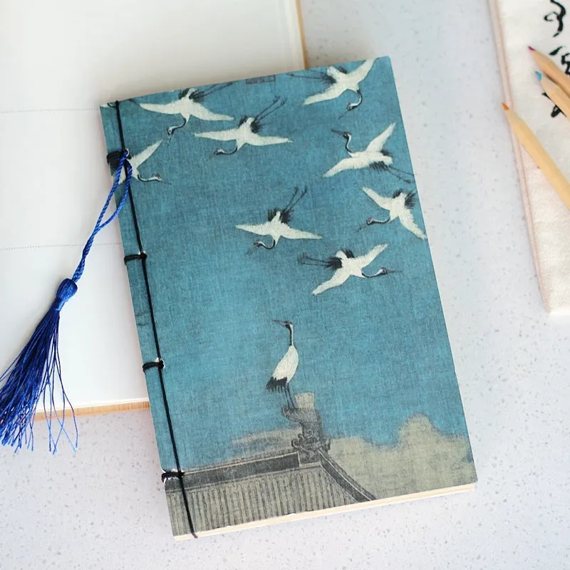 A5 antique-style wire-bound notebook with vintage Chinese painting cover, thread binding, and black wax rope tassel.