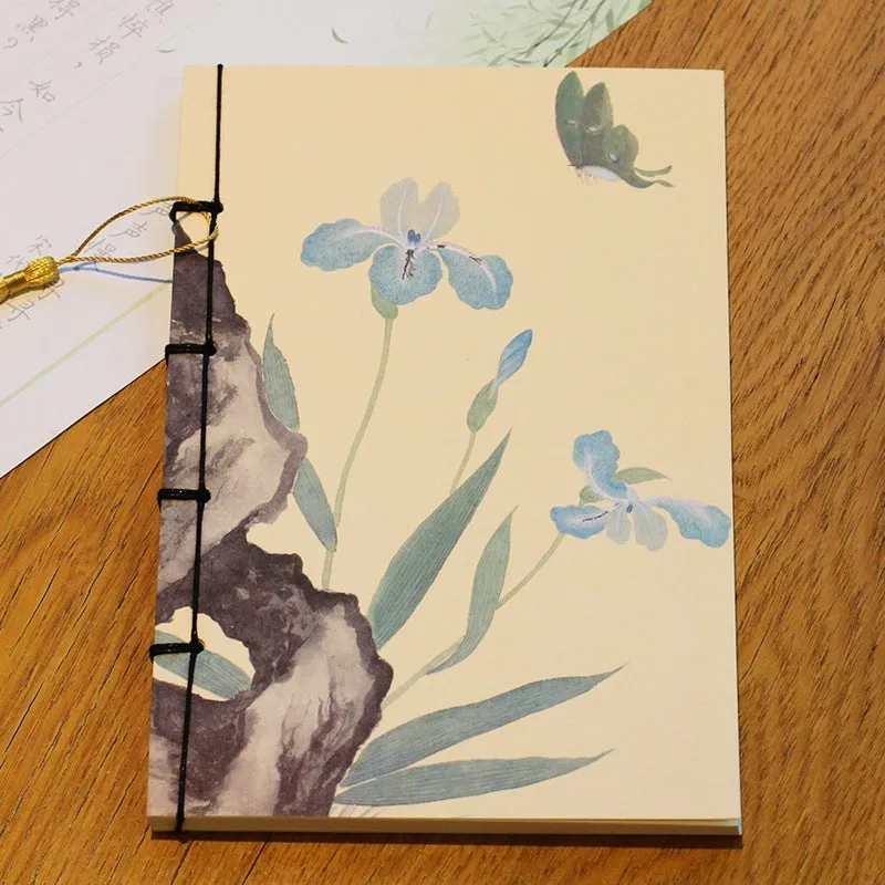 A5 antique-style wire-bound notebook with vintage Chinese painting cover, thread binding, and black wax rope tassel.
