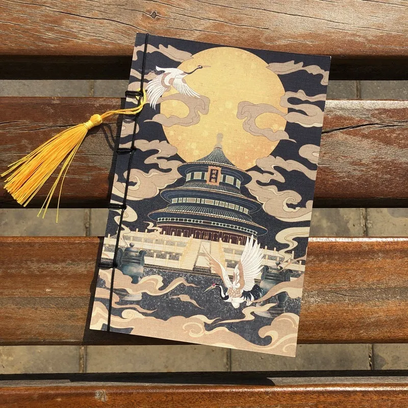 A5 antique-style wire-bound notebook with vintage Chinese painting cover, thread binding, and black wax rope tassel.