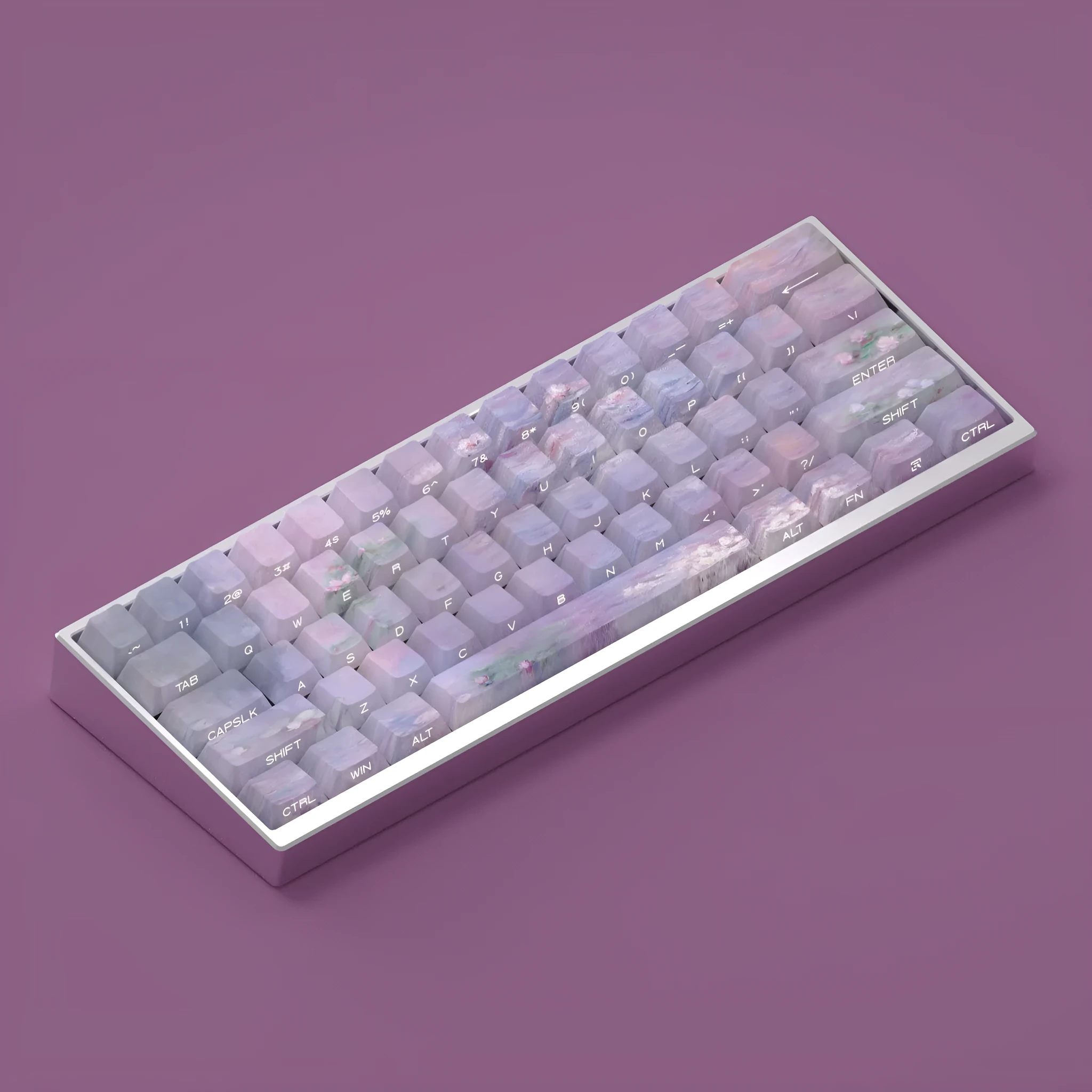Set of white PBT keycaps with colourful water lily design on top and sides, showing side-engraved transparent characters.