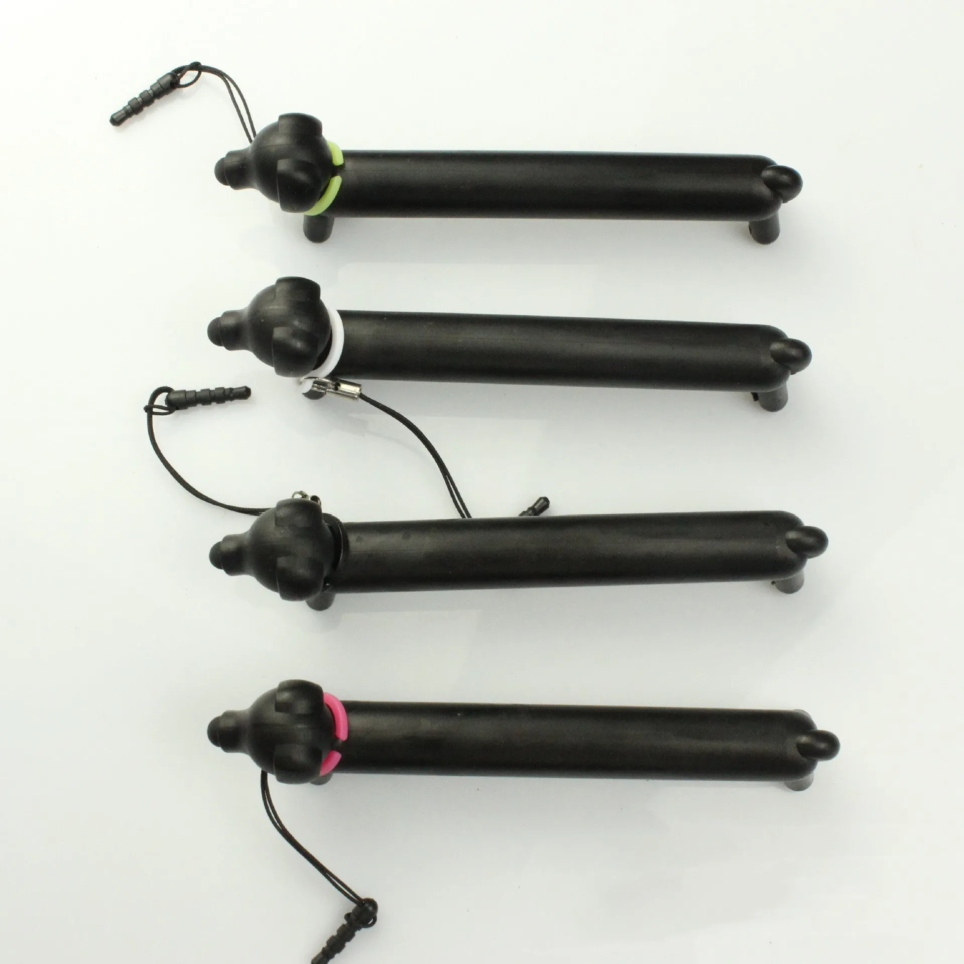 Black dog-shaped touch screen stylus with adjustable length and phone holder stand base