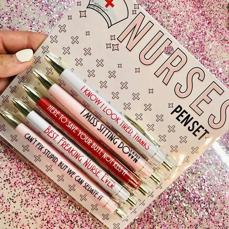 Five nurse theme ballpoint pens with humorous decoration arranged together
